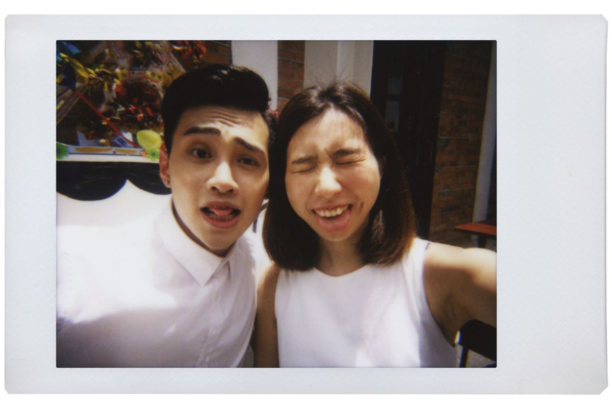 lomography instant mini film picture of a happy couple posing taken on fujifilm instax 