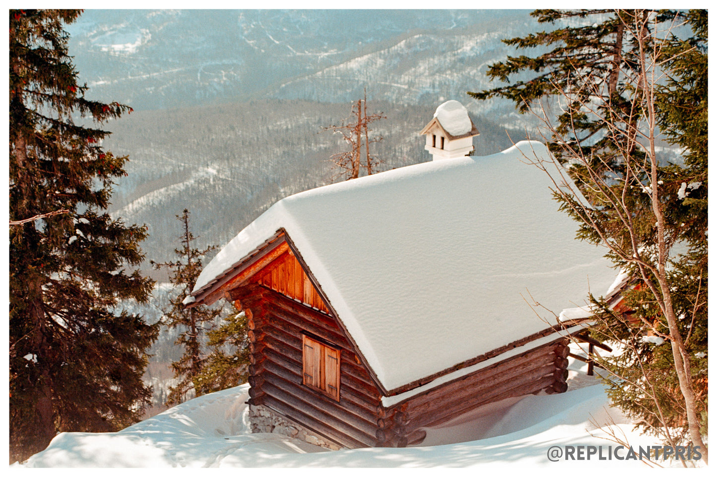 Kodak 35mm Ektar 100 snowy cabin photo by replicantpris